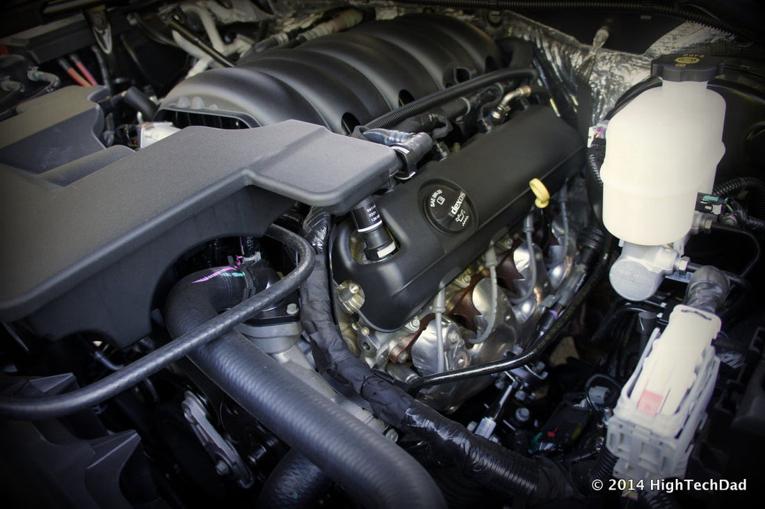 A GM LS-based V8 engine in a 2015 GMC Yukon Denali. AFM components such as the switchable lifters are located inside the engine and are not visible in this exterior engine-bay photo.